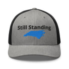Still Standing - Hurricane Helene Natural Disaster Relief Trucker Hat TENWRA™
